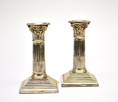 Lot 73 - A pair of Victorian Corinthian column silver mounted candlesticks