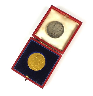 Lot 277 - A Victoria 60 year anniversary 1837-97 gold medal within original fitted case, diameter 25mm weight 13 grams, together with 60th anniversary silver medal, diameter 25 mm