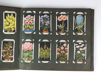 Lot 244 - Five albums of cigarette cards by Wills, Players, Lambert and Butlers, Ogdens sets to include...