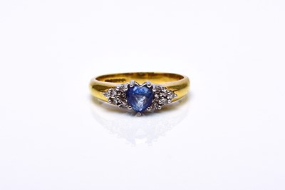 Lot 264 - An 18ct gold sapphire and diamond ring