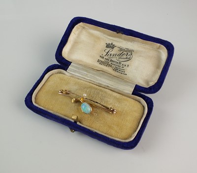 Lot 307 - An early 20th century opal and seed pearl bar brooch
