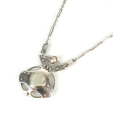 Lot 328 - A Murrle Bennett Arts & Crafts silver and mother of pearl pendant on chain