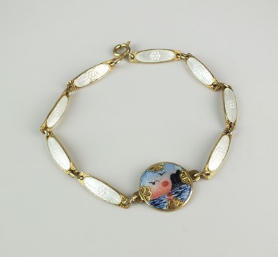 Lot 411 - A silver gilt and enamel bracelet