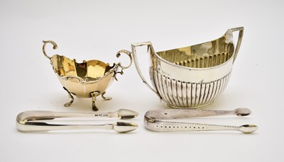 Lot 76 - Two silver sugar bowls and two pairs of silver sugar tongs