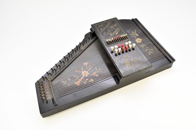 Lot 592 - An early 20th century squeeze box, a cased mandolin and a Meinhold's Autoharp Miranda