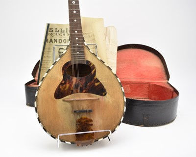 Lot 592 - An early 20th century squeeze box, a cased mandolin and a Meinhold's Autoharp Miranda