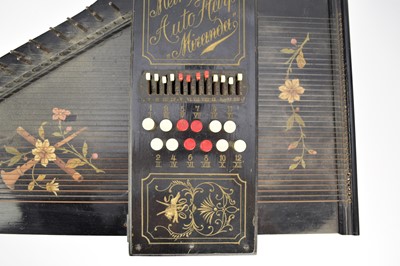 Lot 592 - An early 20th century squeeze box, a cased mandolin and a Meinhold's Autoharp Miranda