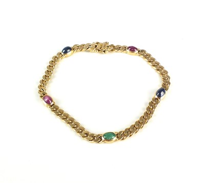 Lot 261 - A multi-gem set bracelet