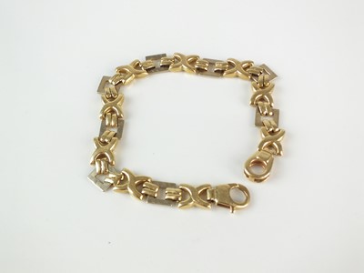 Lot 247 - An Italian yellow metal cross link bracelet