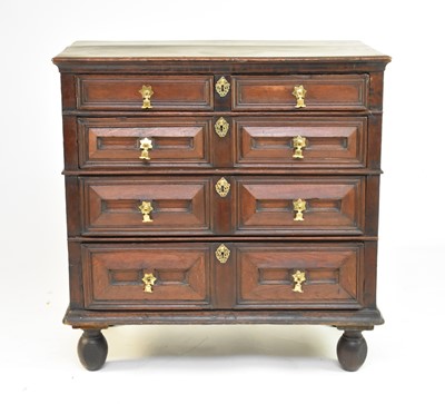 Lot 335 - An oak geometric chest of drawers, circa 1700