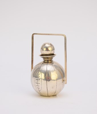 Lot 50 - A silver novelty table lighter in the form of a football