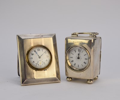 Lot 115 - A miniature silver mounted carriage timepiece together with a silver mounted desk clock