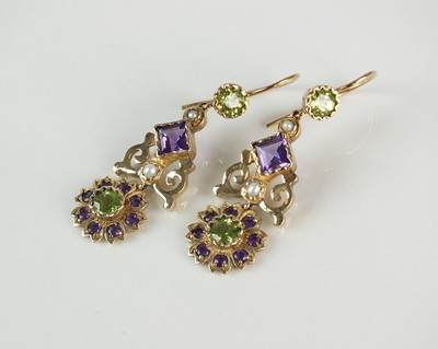 Lot 199 - A pair of peridot, amethyst and split seed pearl ear pendants