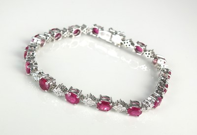Lot 50 - An 18ct white gold ruby and diamond bracelet