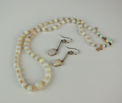 Lot 339 - A graduated opal bead necklace and a pair of earrings