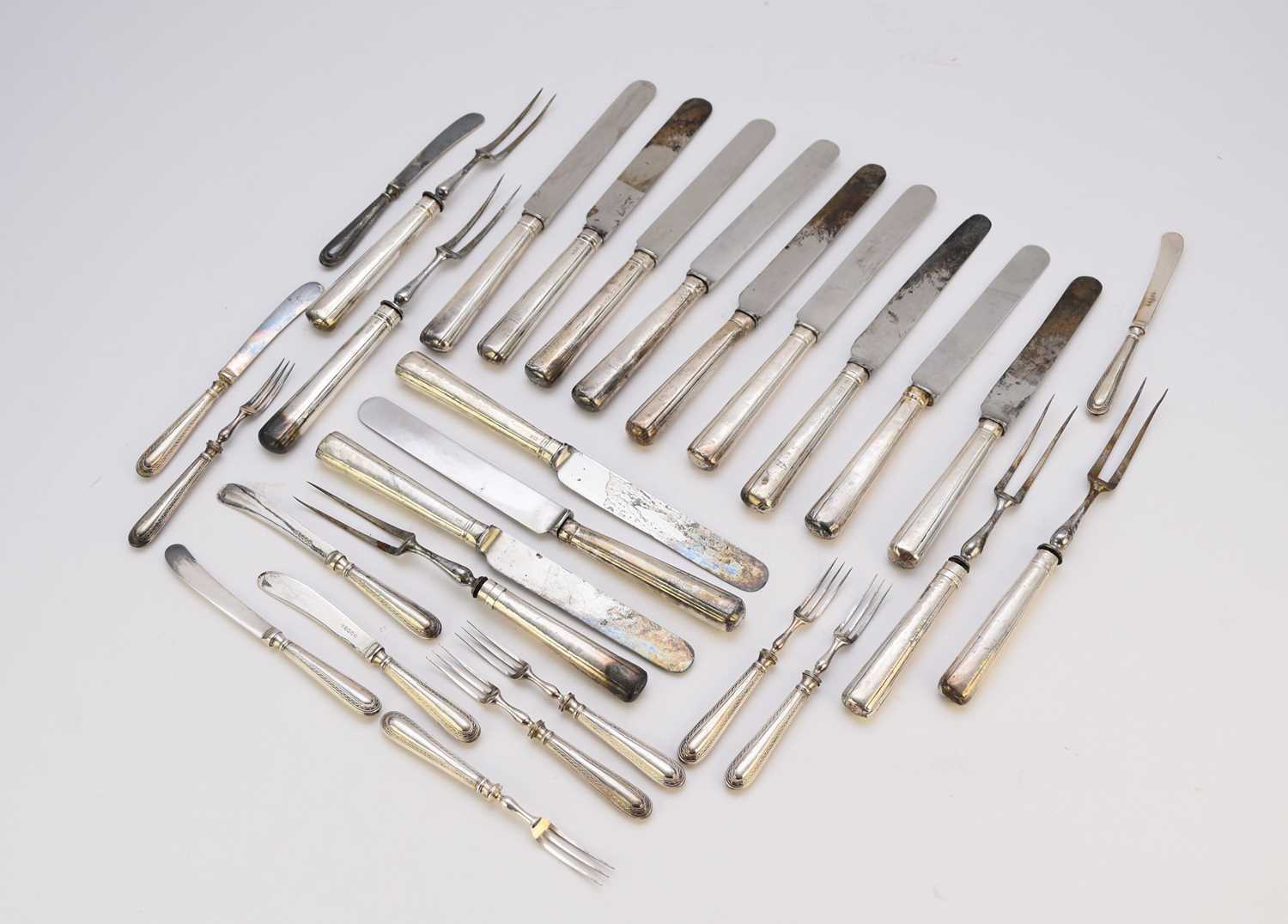 Lot 72 - A collection of silver handled knives and forks
