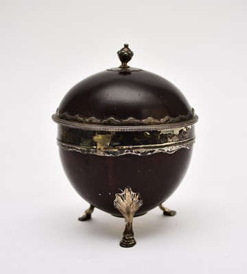 Lot 92 - An 18th century silver mounted coconut cup and cover