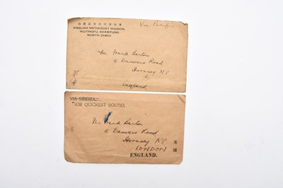 Lot 182 - A box of world stamps containing three albums, a small box of stamps in packets and another "off paper"