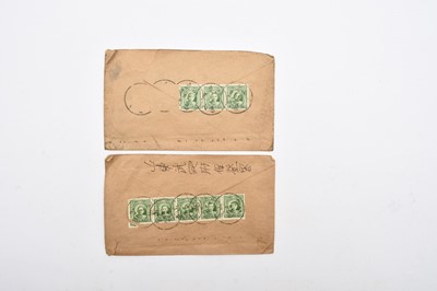 Lot 182 - A box of world stamps containing three albums, a small box of stamps in packets and another "off paper"