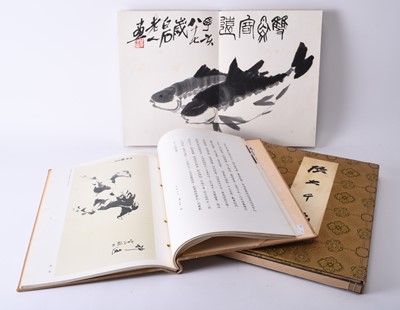 Lot 178 - Qi Baishi (1864-1957), a bound volume of block prints and two other Chinese art reference works