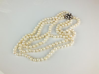 Lot 230 - A three strand uniform cultured pearl necklace