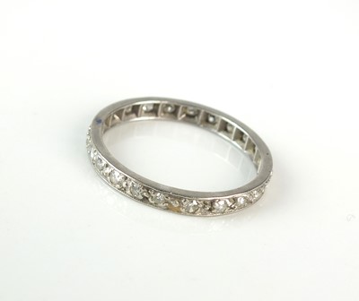 Lot 308 - A diamond set eternity band