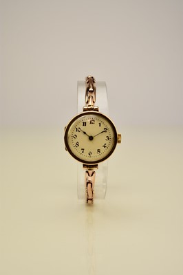 Lot 398 - A lady's 9ct gold bracelet watch