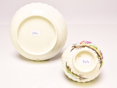 Lot 136 - Caughley polychrome tea bowl and saucer painted with Fancy Birds, circa 1783-93