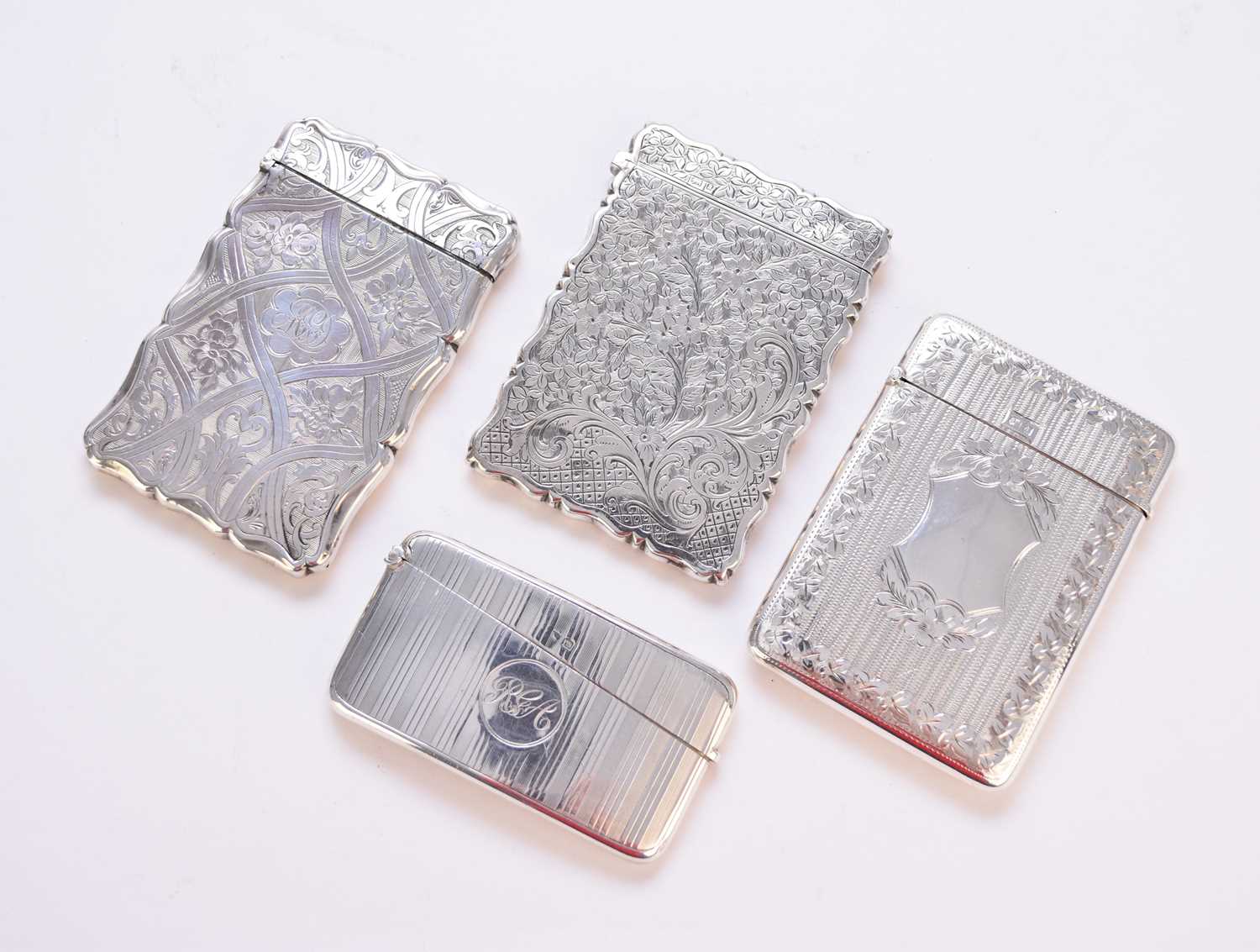 Lot 53 - Four silver card cases