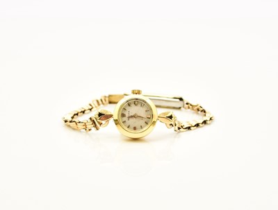 Lot 415 - Rolex: A lady's 18ct gold bracelet watch