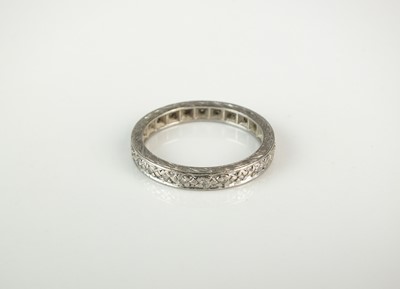 Lot 295 - A diamond set eternity band