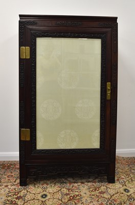 Lot 209 - A Chinese Hongmu cabinet, late 19th century