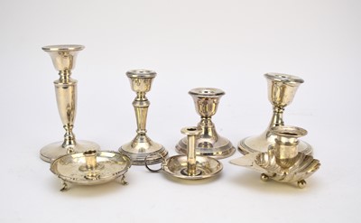 Lot 35 - A collection of seven silver candlesticks