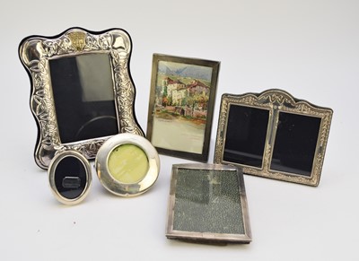 Lot 87 - A collection of six silver mounted photograph frames