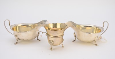 Lot 2 - A pair of silver sauce boats and a silver cream jug