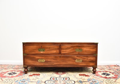 Lot 204 - A reproduction campaign type coffee table chest