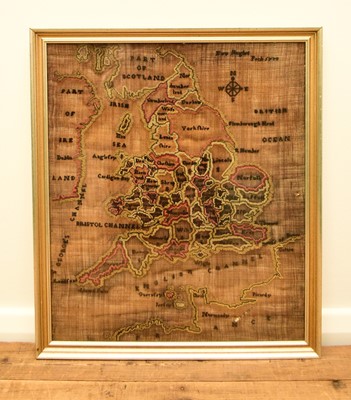 Lot 587 - A needlework map of Britain, framed