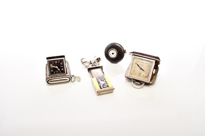 Lot 371 - Two 1930s travel watches, an enamel brooch watch and a gunmetal buttonhole watch (4)