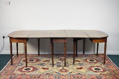 Lot 184 - A George III mahogany D-end extending dining table