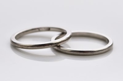 Lot 332 - Two white metal wedding bands