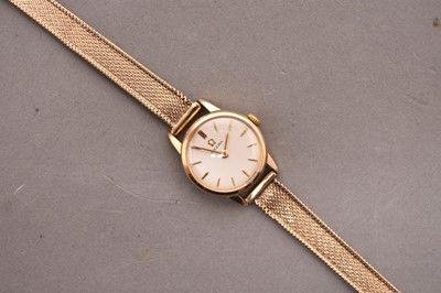 Lot 322 - Omega: A lady's wristwatch with 9ct gold bracelet