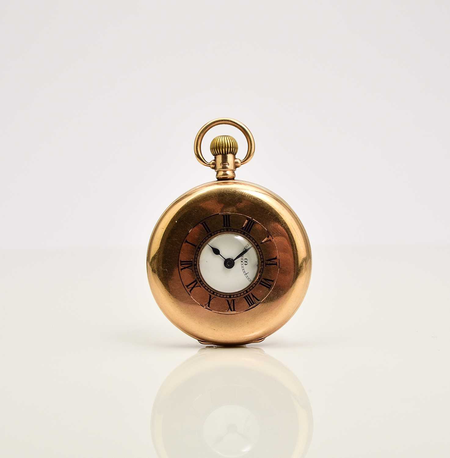 Lot 388 - Rolex: A 9ct gold half hunter pocket watch