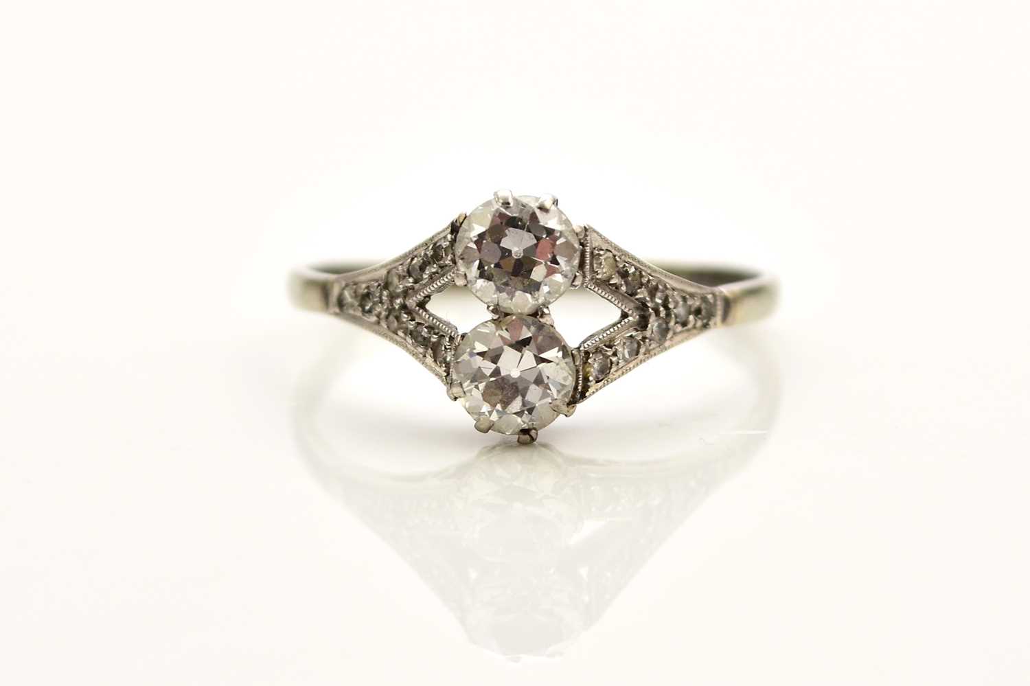 Lot 242 - A two stone diamond ring