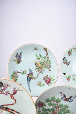 Lot 69 - Nine Chinese celadon famille rose dishes, Qing Dynasty
