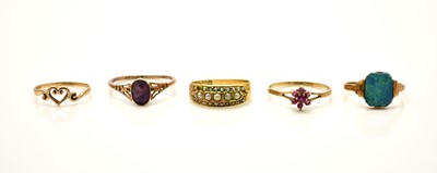 Lot 357 - A group of five stone set rings