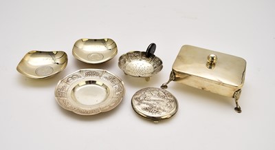 Lot 11 - A small collection of white metal