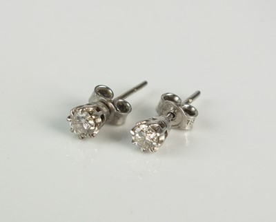 Lot 315 - A pair of 18ct white gold diamond ear studs