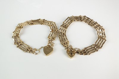 Lot 235 - Two 9ct gold four link gate bracelets