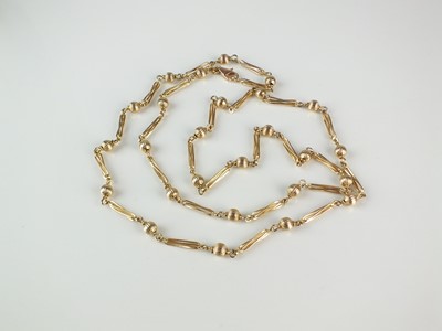 Lot 276 - A 9ct gold bead and decorative link necklace