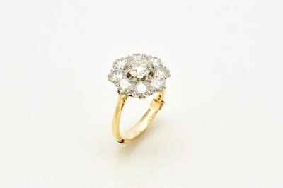 Lot 32 - An 18ct gold diamond floral cluster ring